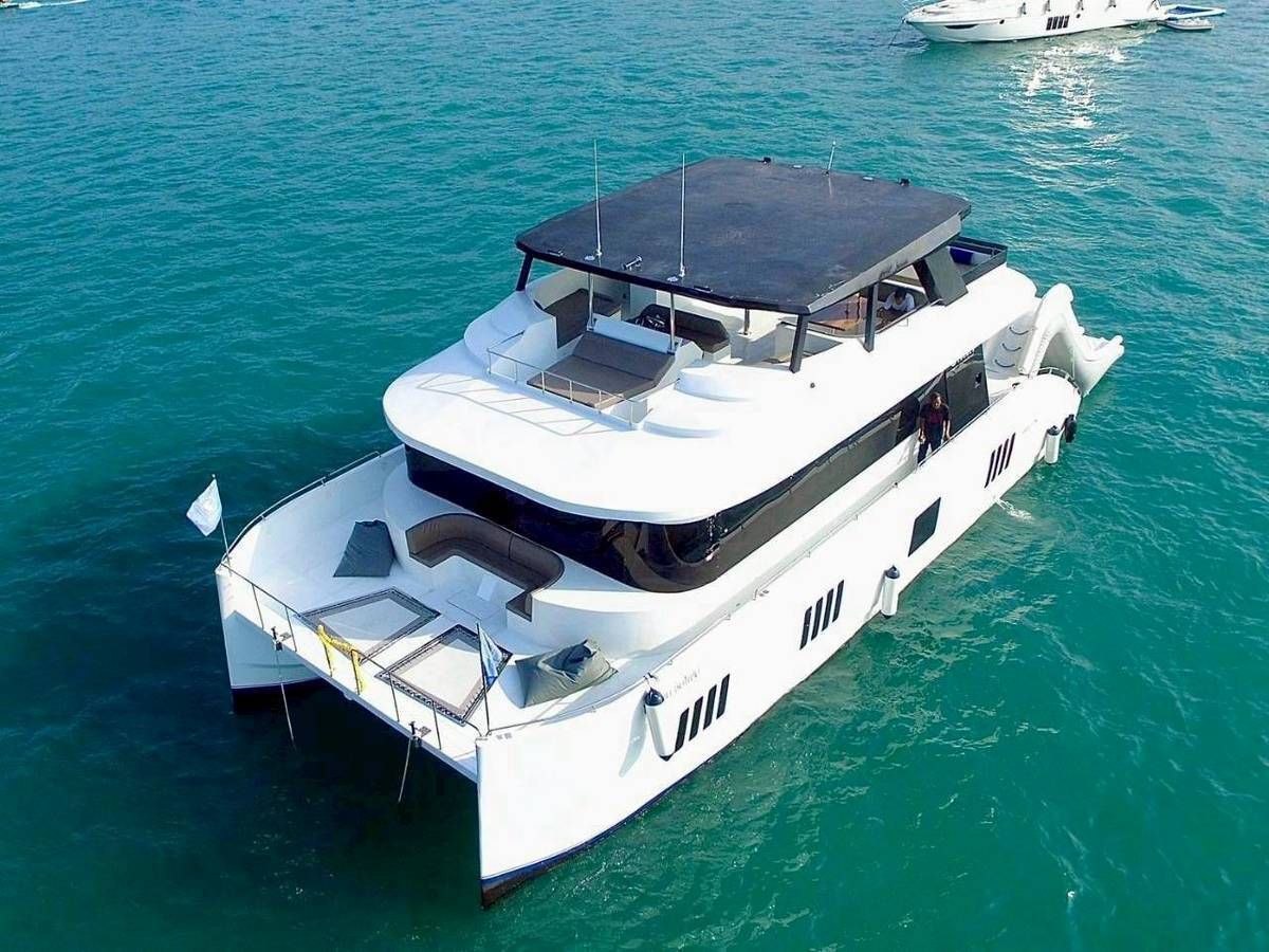 Ocean Symphony motor catamaran with a roofed upper deck in Pattaya