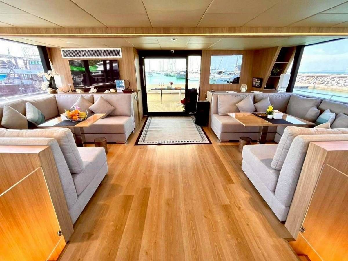 Air-conditioned saloon inside Ocean Symphony catamaran