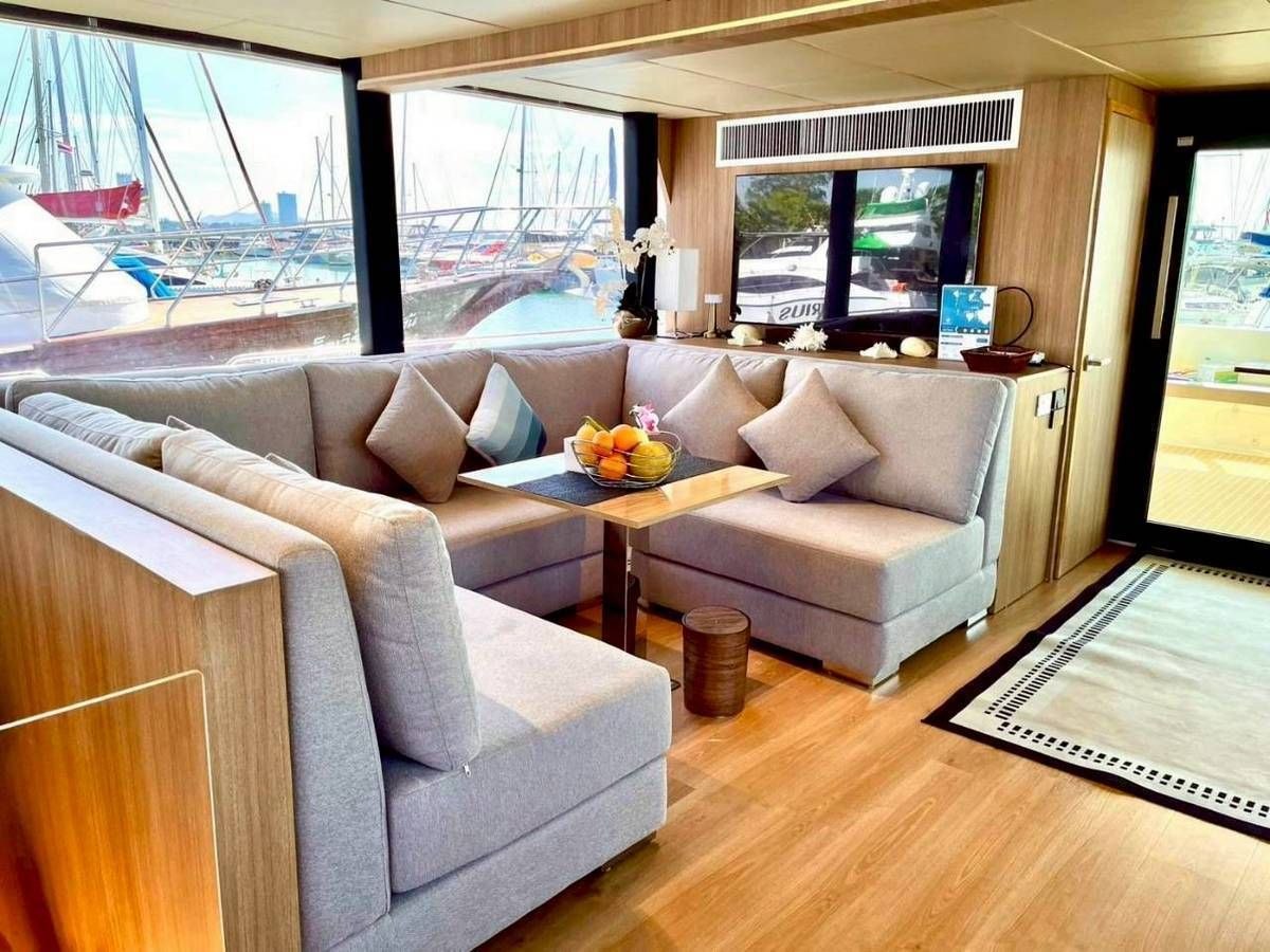 Spacious lounge seating inside Ocean Symphony