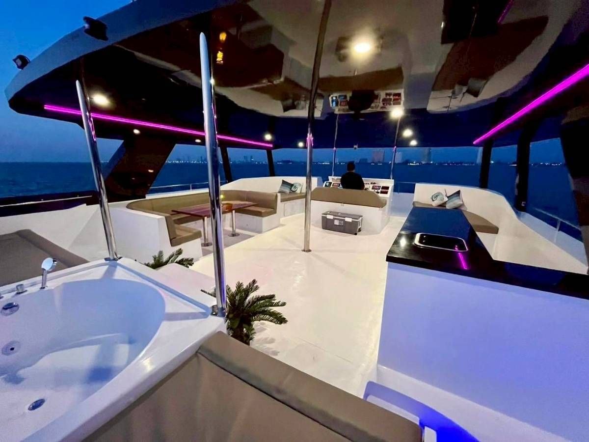 Ocean Symphony upper deck with evening LED lighting and jacuzzi